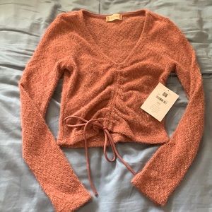 Alters state pink/purple sweater